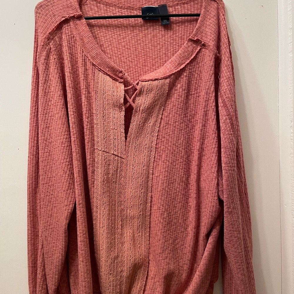 Rust color with long sleeves and elastic band.